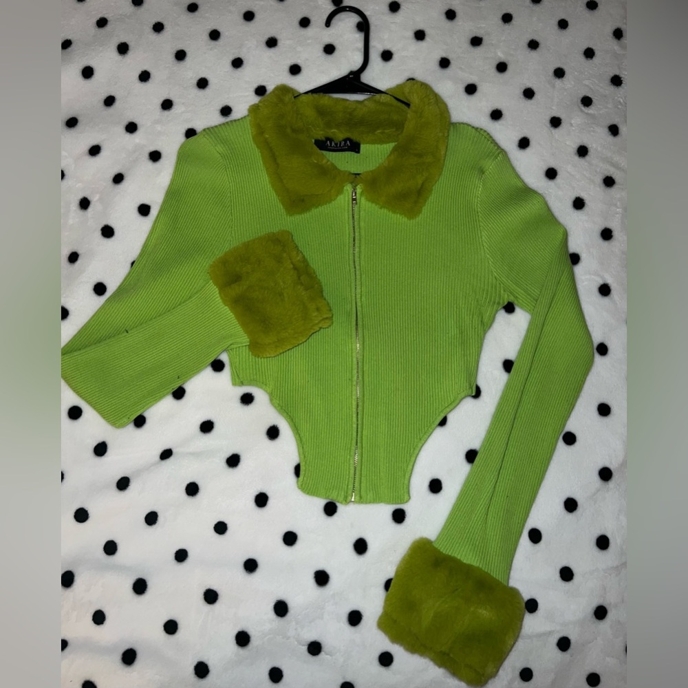 Cropped green sweater with faux fur cuffs